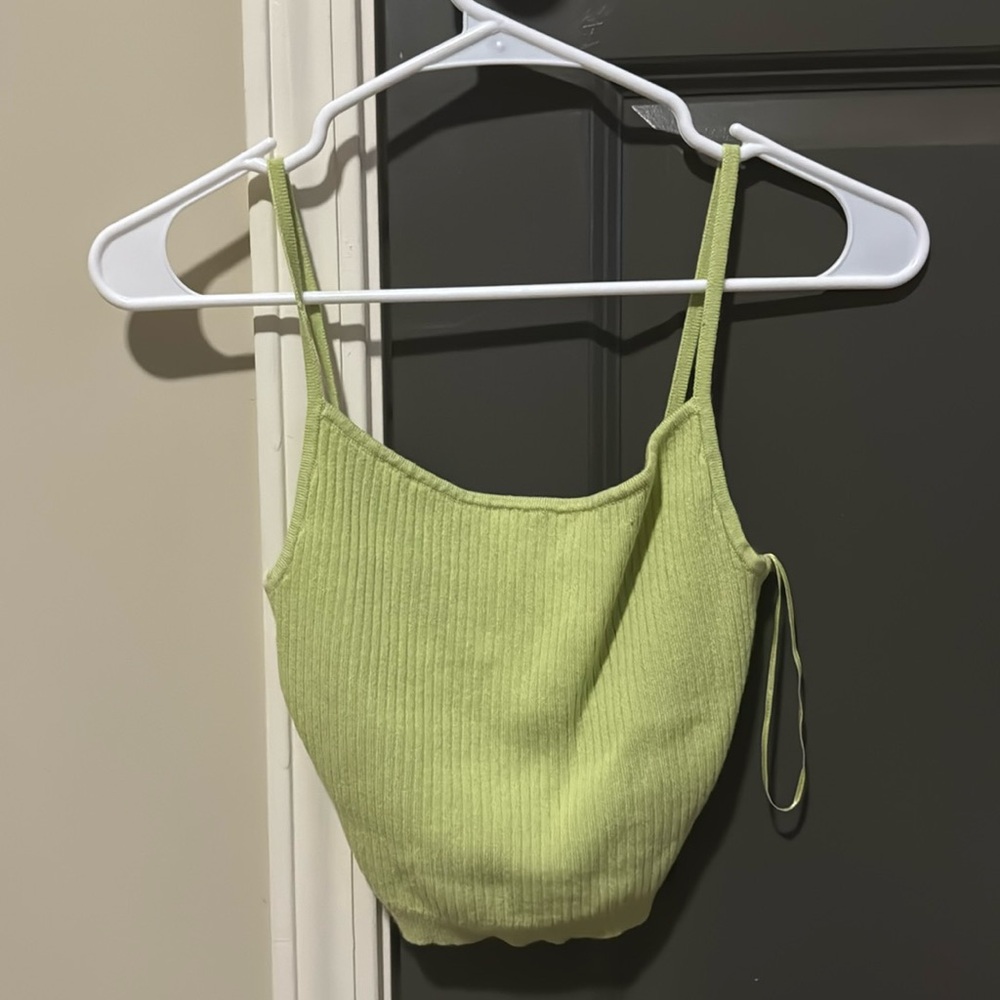 Green tank top slightly cropped. Price is negotiable